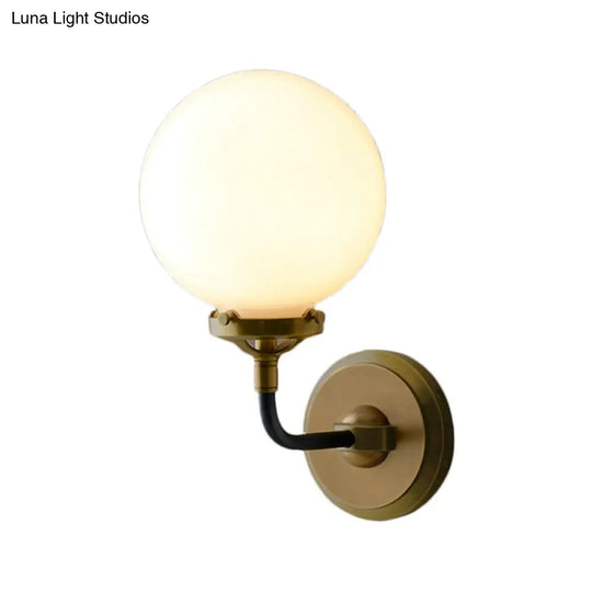 Modern Opal Glass Sconce Light With Globe Shade In Antique Brass/Chrome
