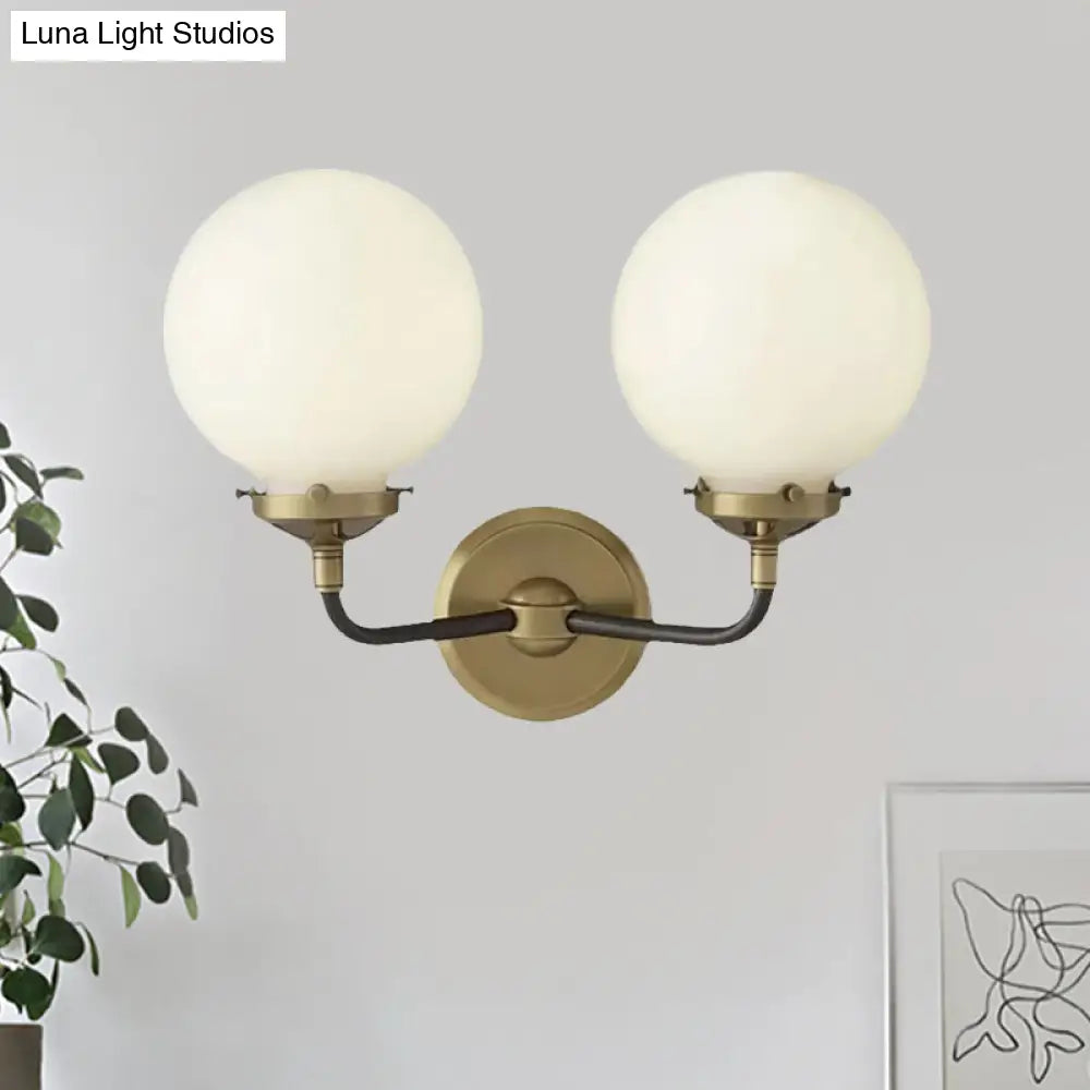 Modern Opal Glass Sconce Light With Globe Shade In Antique Brass/Chrome