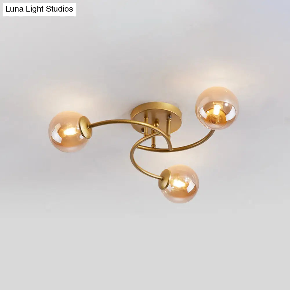 Modern Swirled Metal Semi Flush Ceiling Light With Glass Ball Shade 3 / Gold Cognac