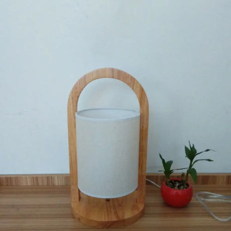Modern White Cylindrical Nightstand Lamp With Wood Handle - Task Light Fabric Shade 1 Bulb