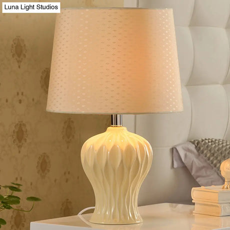 Modern White Fabric Barrel Task Lamp With Ceramic Urn Base - 1 Bulb Table Light