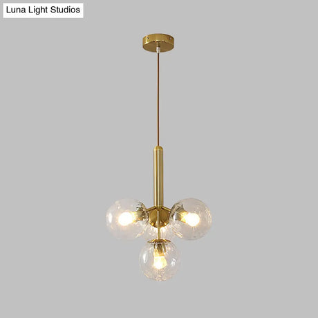 Modernist Gold Globe Pendant Light Fixture - Clear Water Glass 4 Heads