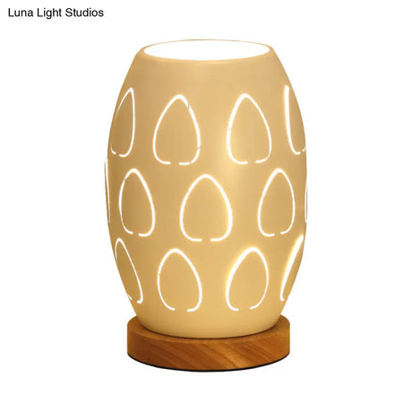 Modernist Oblong White Night Table Lamp With Hollow Out Design - Sleek Metal Construction 1 Head For
