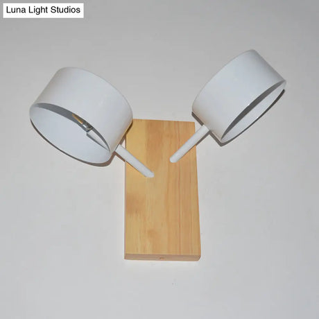 Modernist White Dual Drum Wall Light Fixture With 2 Iron Sconce Heads And Wood Backplate