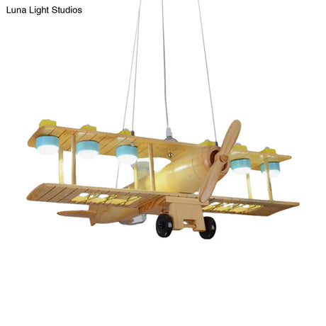 Nordic Beige Wood Pendant Light: Glider Shaped Hanging Light For Kindergarten