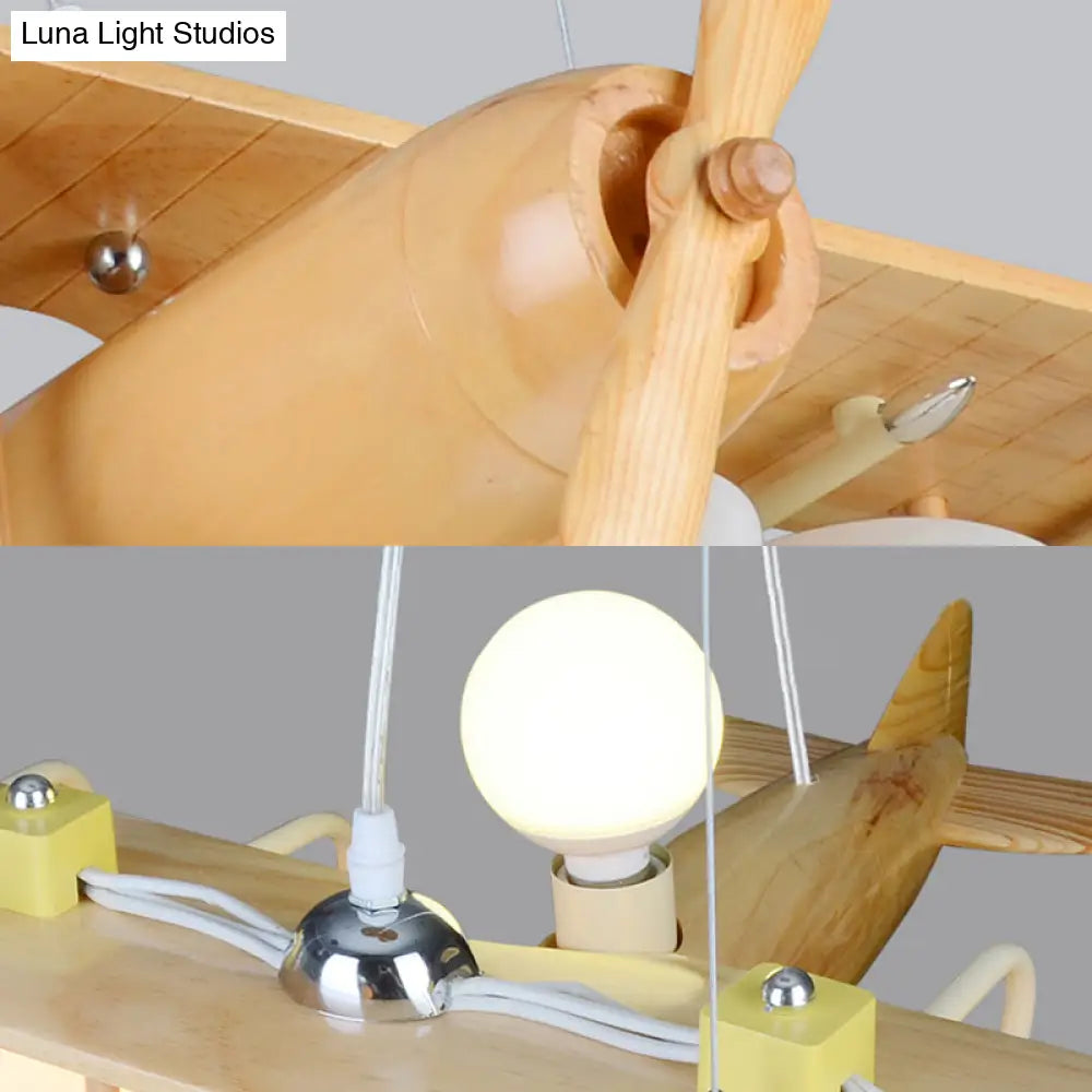 Nordic Beige Wood Pendant Light: Glider Shaped Hanging Light For Kindergarten