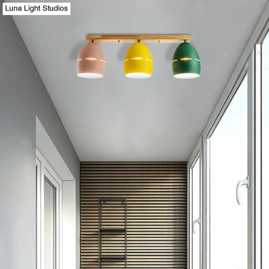 Nordic Wood Finish Linear Semi-Flushmount Light: 3 Lights And Oval Metal Shade Green-Yellow-Pink