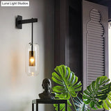 Postmodern Capsule Wall Hanging Light Clear Glass Bedside Lamp 1 Bulb Interior Mesh Guard Black/Gold