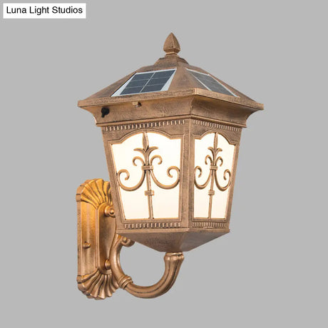 Quartet Religion Wall Lamp: Rustic 1-Light Sconce With Solar Panel Brass Finish