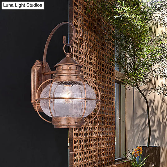Retro Coffee/Bronze Lantern Wall Light With Wire Cage - Outdoor 1 Head Lighting In White/Clear Glass