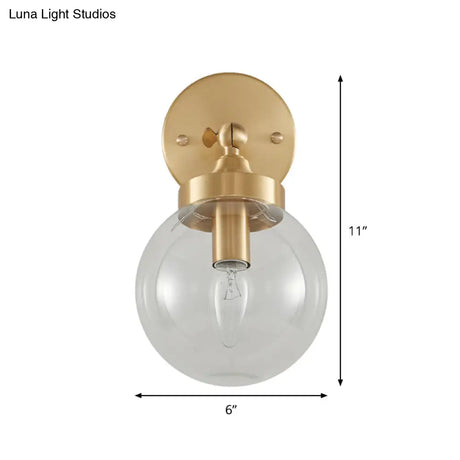 Rotatable Bedroom Wall Lamp In Brass With Clear Glass And Modernist Ball Design