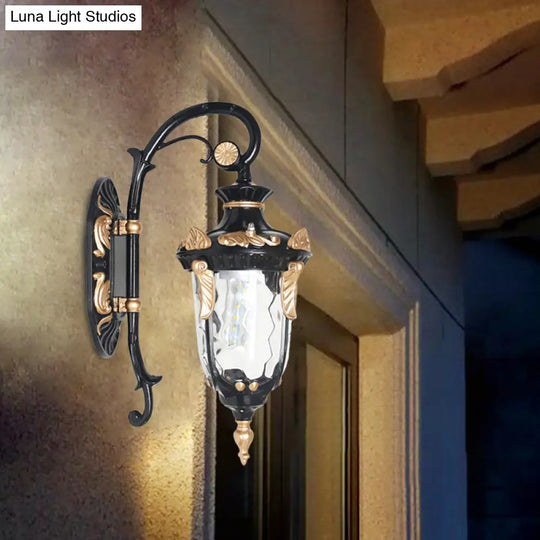 Rural Single Light Clear Glass Wall Sconce - Outdoor Urn Fixture In Black And Gold