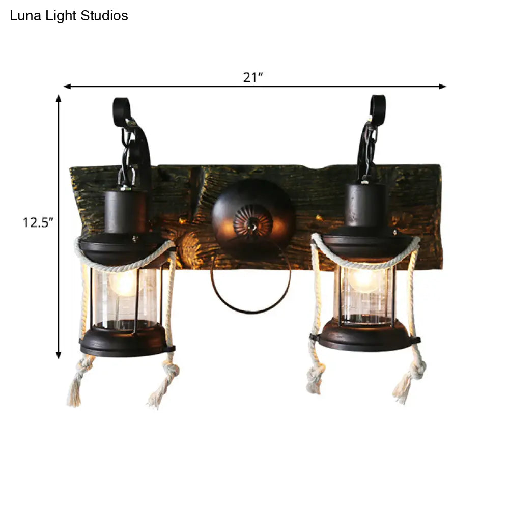 Rustic Lantern Wall Sconce With Clear Glass And 2 Bulbs In Black Finish