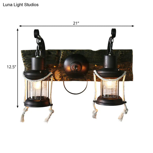 Rustic Lantern Wall Sconce With Clear Glass And 2 Bulbs In Black Finish