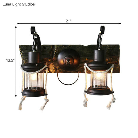 Rustic Lantern Wall Sconce With Clear Glass And 2 Bulbs In Black Finish