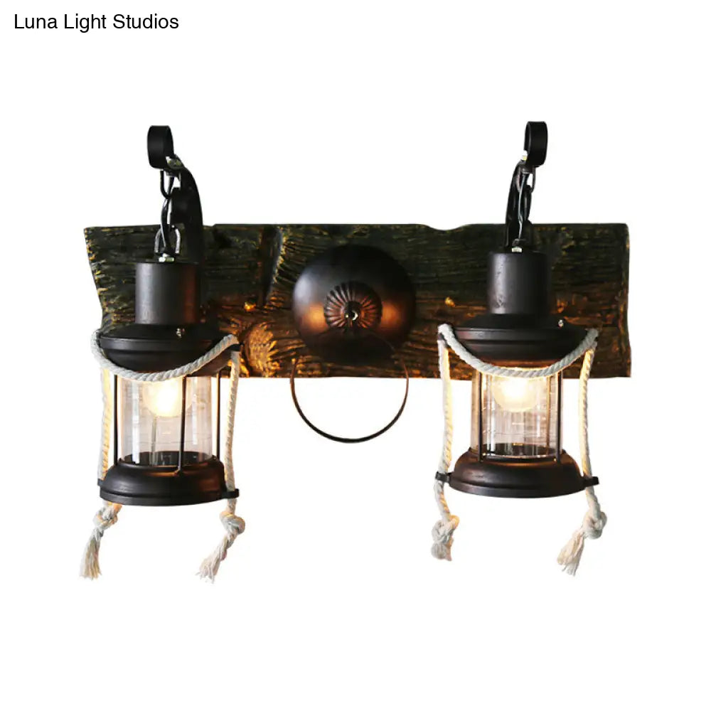 Rustic Lantern Wall Sconce With Clear Glass And 2 Bulbs In Black Finish