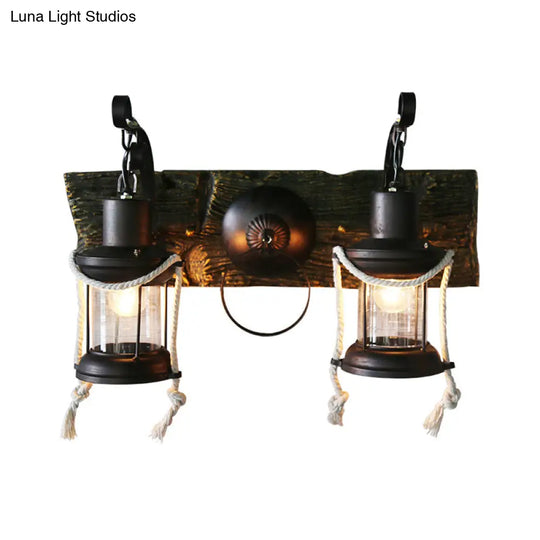 Rustic Lantern Wall Sconce With Clear Glass And 2 Bulbs In Black Finish