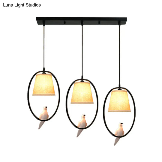 Rustic Pigeon Metal Pendant Light For Oval Dining Room - 3-Light Beige Hanging Fixture