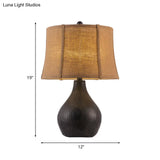 Rustic Resin Teardrop Table Light With Flaxen Drum Fabric Shade - 1 Bulb Nightstand Lamp For Family