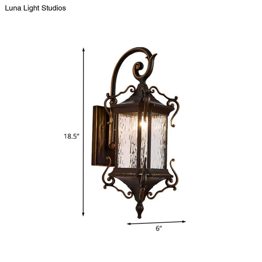 Rustic Water Glass Wall Sconce With Metal Scrolled Arm Single Bulb Coffee Lantern