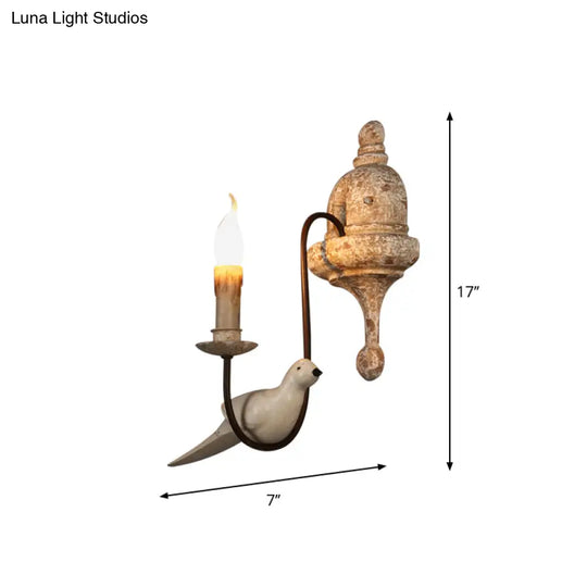 Rustic Wood Swooping Arm Wall Lamp With Distressed White Sconce - Decorative Candle And Bird Accents