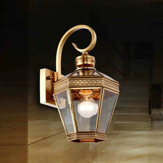 Sleek 1-Light Outdoor Brass Wall Sconce With Clear Glass Lantern Shade