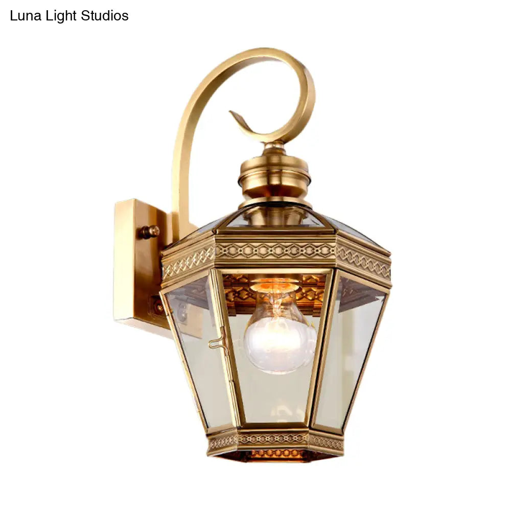 Sleek 1-Light Outdoor Brass Wall Sconce With Clear Glass Lantern Shade