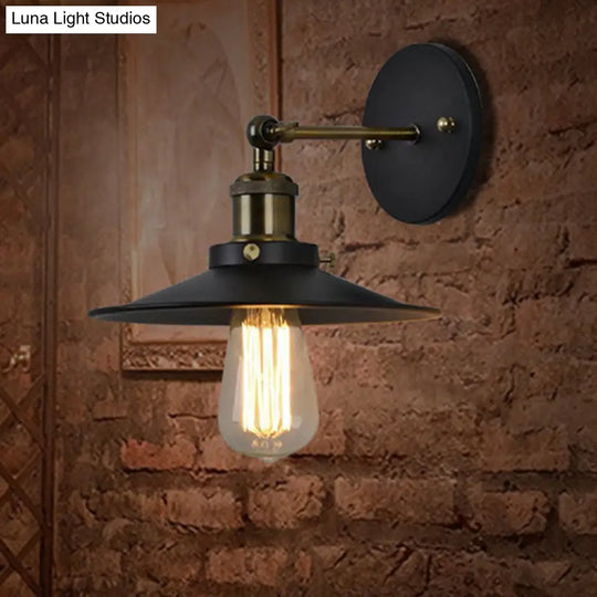Sleek Black Iron Conical Shade Wall Lamp For Simplicity In Restaurant Lighting
