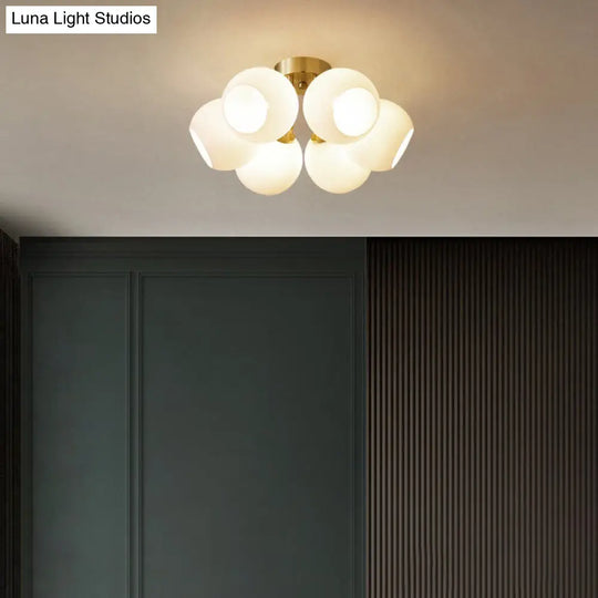 Sleek Brass Domed Semi Flush Mount Ceiling Lamp With Cream Glass - Stylish Bedroom Lighting