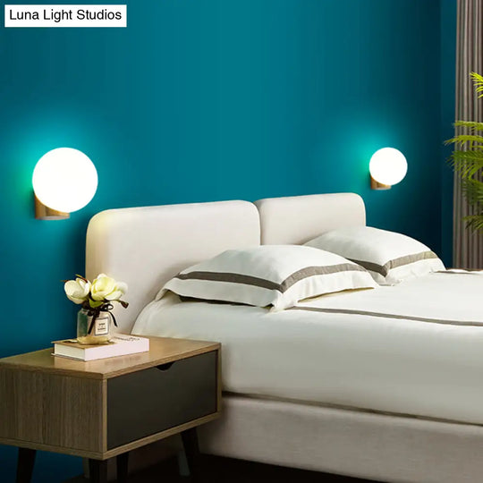 Sleek Opal Glass Wall Mount Lamp - Brass Bedside Sconce Light (1 Bulb)