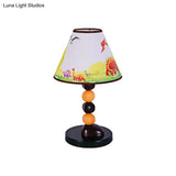 Stylish White Conic Shade Table Lamp With Cartoon Rudder/Dinosaur Pattern - 1 Light Fabric And Metal