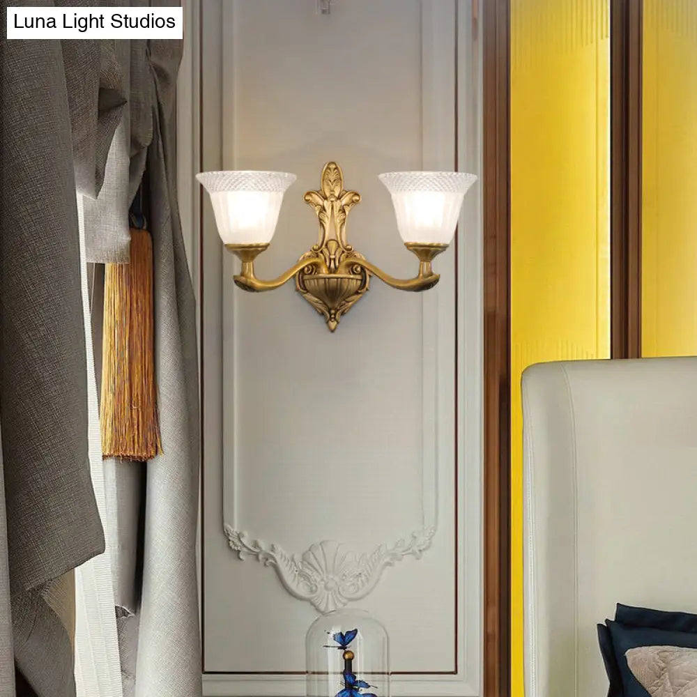 Traditional Bell Wall Sconce With Brass Finish And White Ribbed Glass