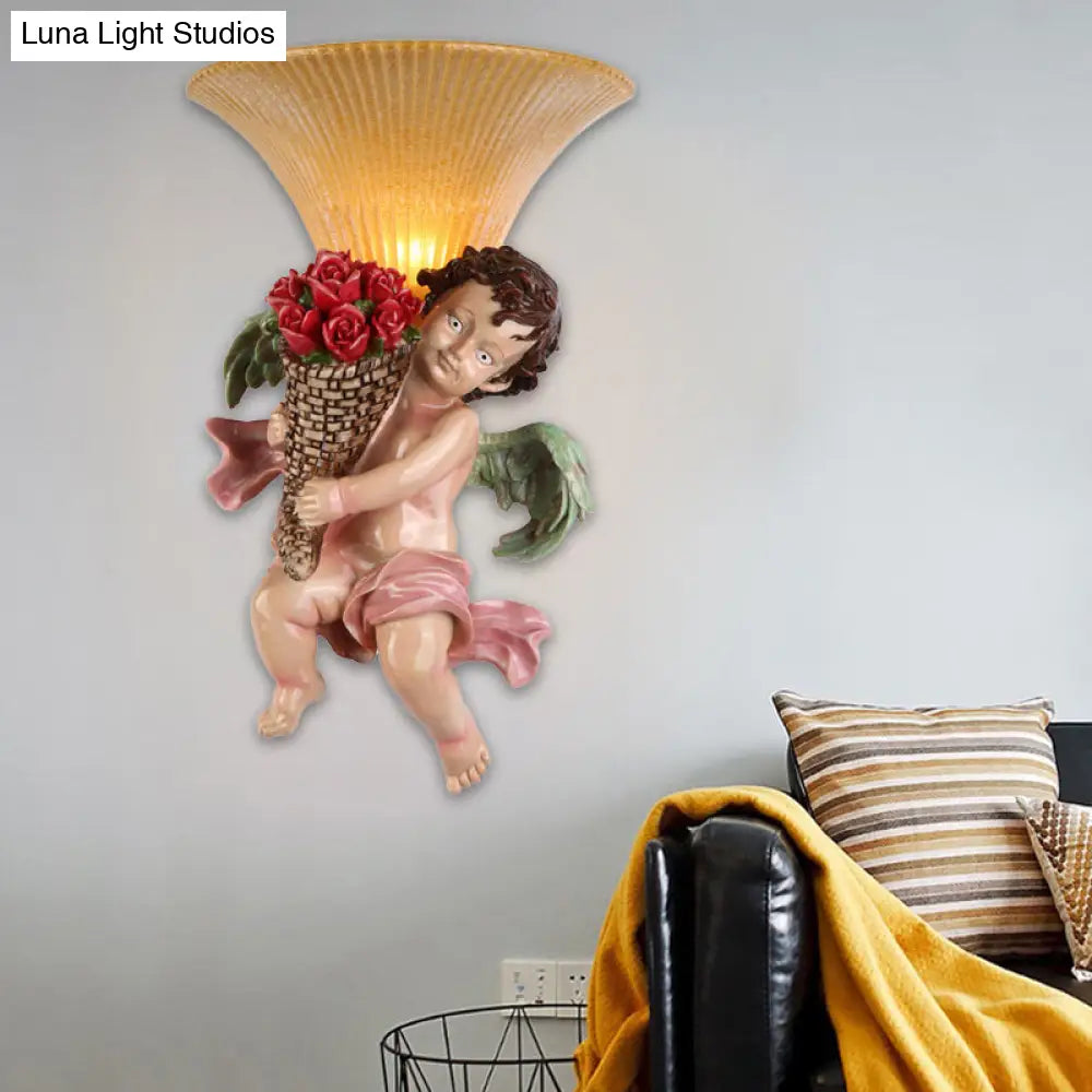 Traditional Boy Holding Rose Resin Wall Sconce Light With Fluted Glass Shade - Yellow