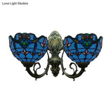 Village Stained Glass Tulip Wall Sconce With Curved Arm - Blue Bowl Shade 2 Lights