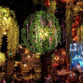 Vintage 4-Head Black Iron Chandelier With Plant Accents