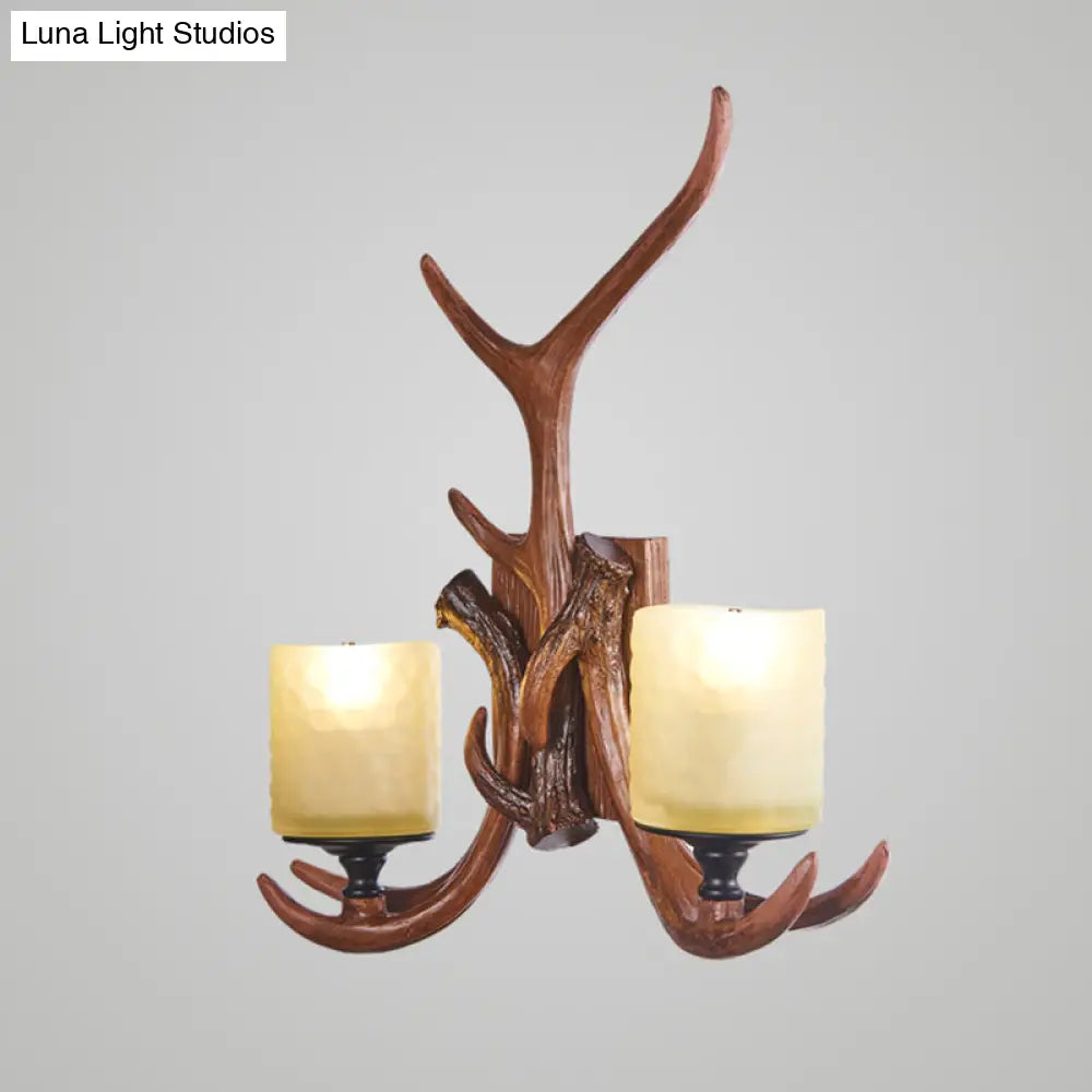Vintage Deer Horn Wall Lamp With Cylinder Beige Glass Shade For Restaurants