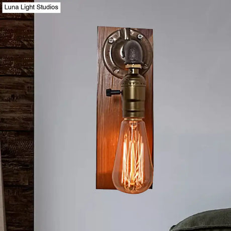 Vintage Metallic Wall Lamp With Aged Brass Sconce And Open Bulb For Living Room