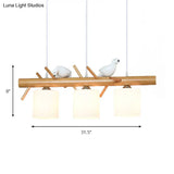 Wooden Hanging Chandelier With 2/3 Lights Glass Cylinder Shade And Bird Décor - Ideal For Dining