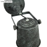Wrought Iron Farmhouse Style Wall Sconce Lamp In Antique Black - 1 Light For Living Room